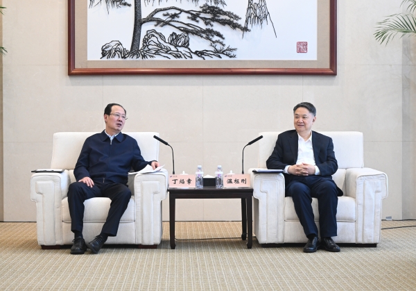 丁焰章與中國華能董事長、黨組書記溫樞剛會談